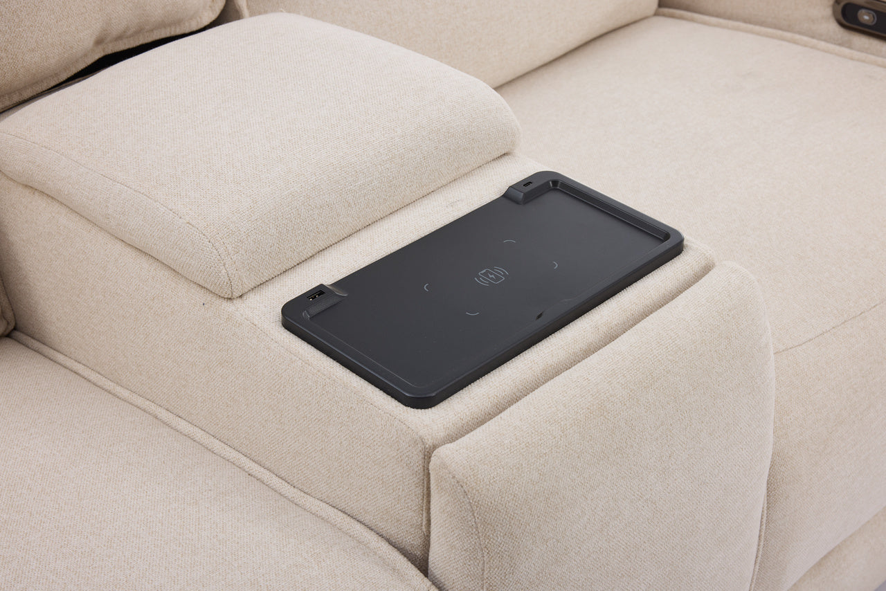 Black tablet stand on a beige sofa